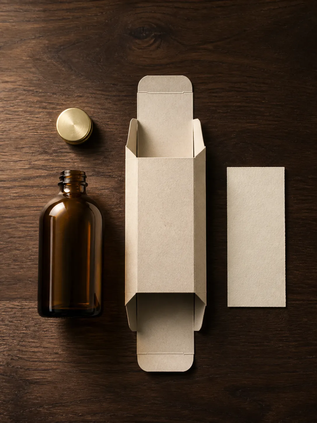 One packaging laid out flat: bottle, cap, folding box and card